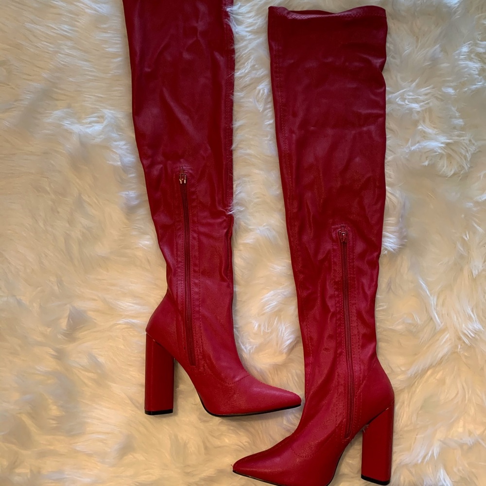Red thigh high boots !